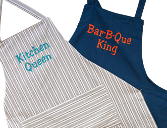 Two embroidered kitchen aprons